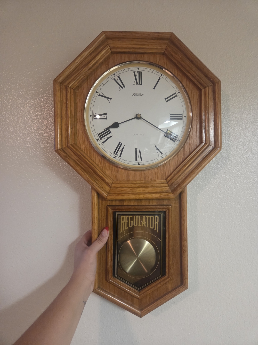 Sunbeam Octagon Wall Clock in Wood Grain and White with Gold Accents